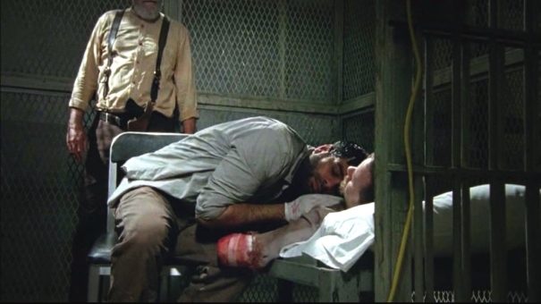 Hershel watches helplessly as Dr. S. loses yet another patient to the flu.